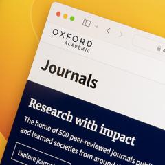 A computer screen displays a webpage titled "Journals" on the Oxford Academic website.